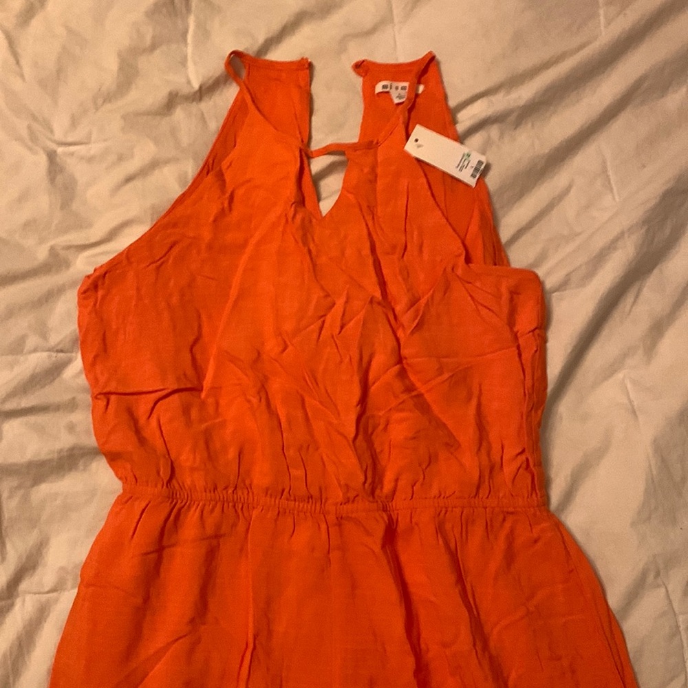 Coral Romper with white embroidery detail, Francesca’s, size large